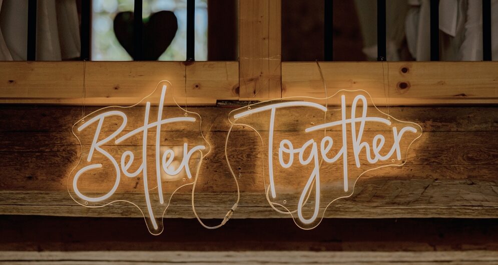 Home Page (new) 5 Neon sign reading Better Together